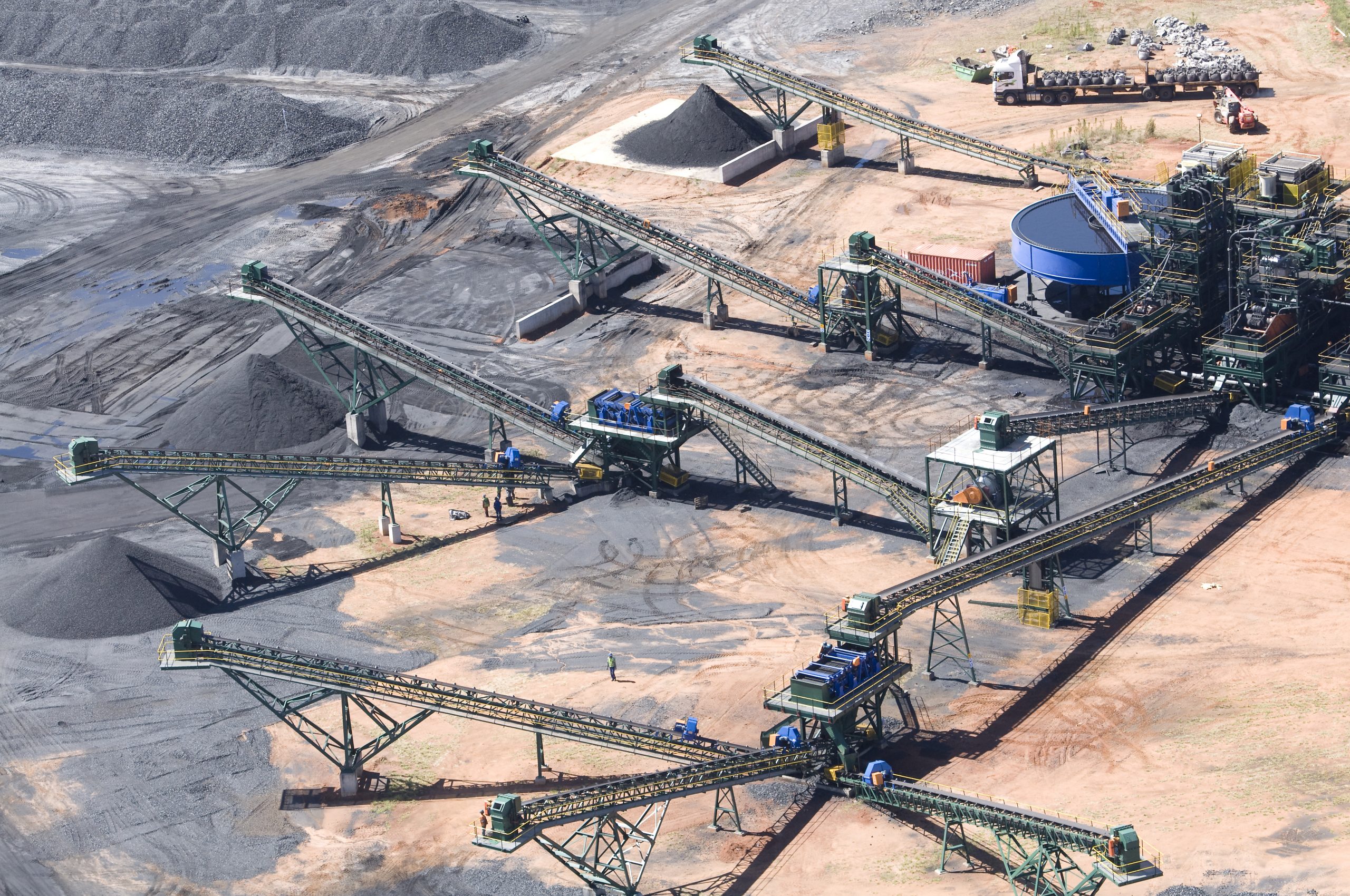 Aerial view of a network of stockpile conveyors at a coal handling plant